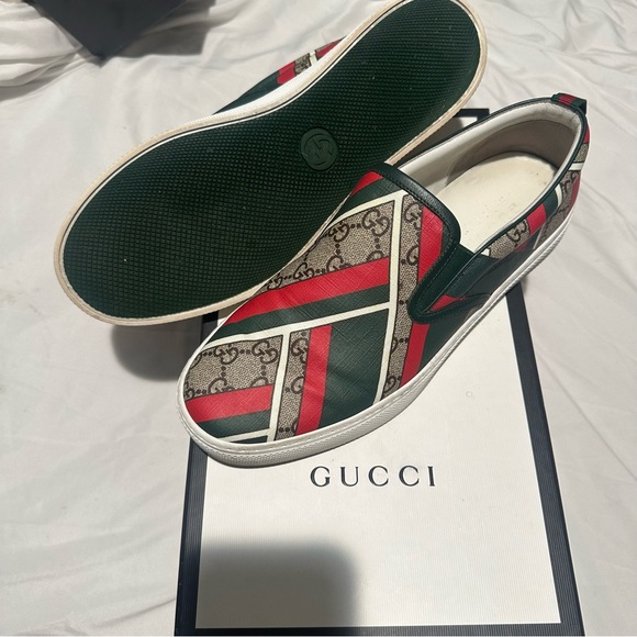 100% AUTHENTIC GUCCI SLIP ONS.  in excellent condition, size 9.5.